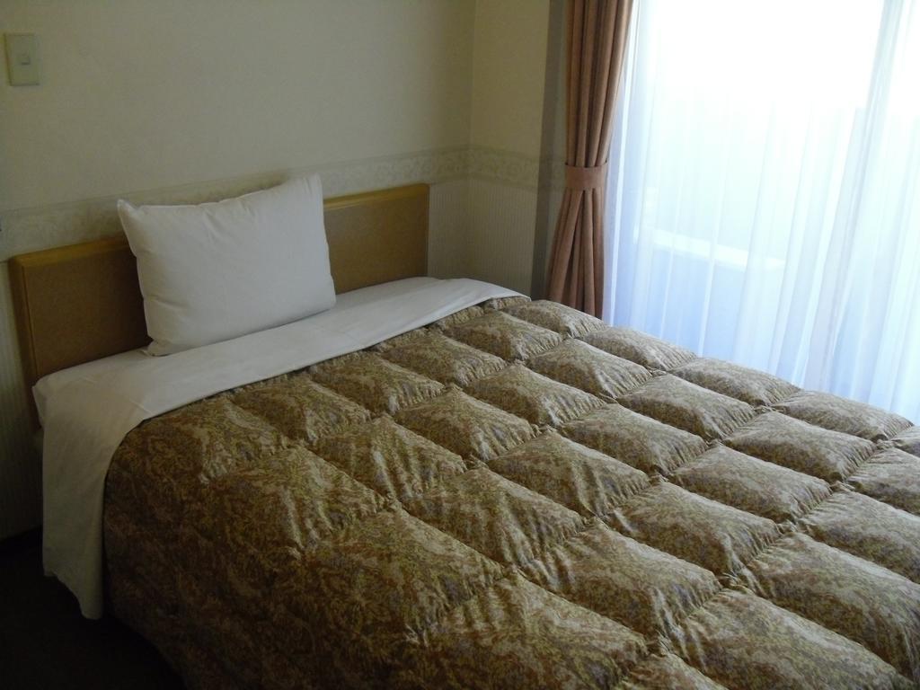 Toyoko Inn Hokkaido Sapporo-Eki Nishi-Guchi Hokudai Mae Экстерьер фото